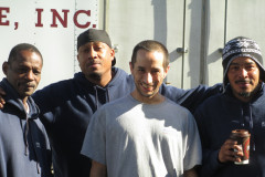 A happy four man crew