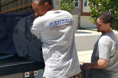 Moving Crew Carfeully Protecting Items Being Moved