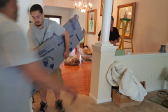 Moving Crew Carefully  Protecting Items Being Moved